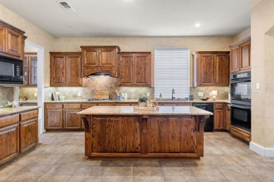Beautiful Highland home in Woodhaven situated in one of on Stonebridge Ranch Country Club - Dye in Texas - for sale on GolfHomes.com, golf home, golf lot
