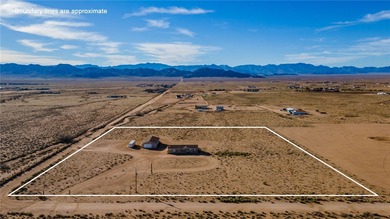 Set on 5 acres in Mountain Vista Ranches, this AR/5A-zoned ranch on Valle Vista Golf Course in Arizona - for sale on GolfHomes.com, golf home, golf lot