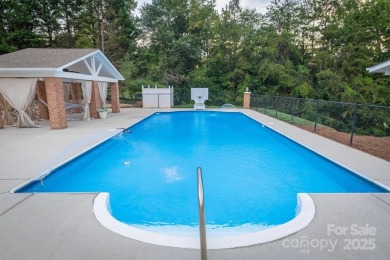 This beautifully updated home is perfectly designed for modern on Catawba Springs Golf Course At Lake Hickory  in North Carolina - for sale on GolfHomes.com, golf home, golf lot