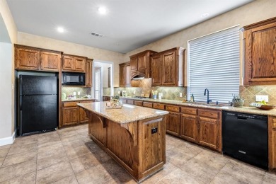 Beautiful Highland home in Woodhaven situated in one of on Stonebridge Ranch Country Club - Dye in Texas - for sale on GolfHomes.com, golf home, golf lot