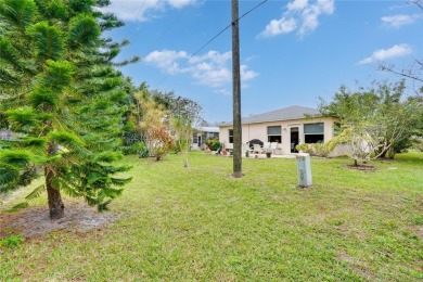 CBS 3 bedroom 2 bathroom home on a pet-friendly lot located on a on Spanish Lakes Country Club in Florida - for sale on GolfHomes.com, golf home, golf lot