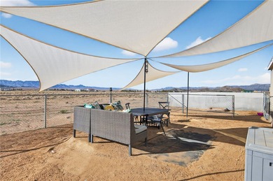 Set on 5 acres in Mountain Vista Ranches, this AR/5A-zoned ranch on Valle Vista Golf Course in Arizona - for sale on GolfHomes.com, golf home, golf lot