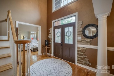 This beautifully updated home is perfectly designed for modern on Catawba Springs Golf Course At Lake Hickory  in North Carolina - for sale on GolfHomes.com, golf home, golf lot