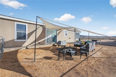 Set on 5 acres in Mountain Vista Ranches, this AR/5A-zoned ranch on Valle Vista Golf Course in Arizona - for sale on GolfHomes.com, golf home, golf lot