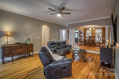 This beautifully updated home is perfectly designed for modern on Catawba Springs Golf Course At Lake Hickory  in North Carolina - for sale on GolfHomes.com, golf home, golf lot