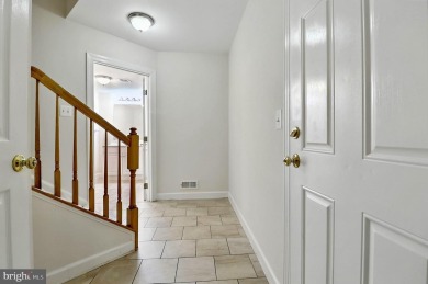 Located on one of the neighborhood's most coveted lots, this on Virginia Oaks Golf Club in Virginia - for sale on GolfHomes.com, golf home, golf lot