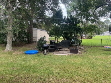 Come a see this great 3/2 Pool Home in the very desirable Citrus on Citrus Springs Country Club in Florida - for sale on GolfHomes.com, golf home, golf lot