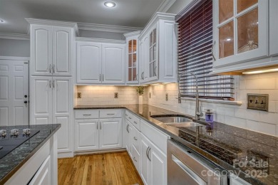 This beautifully updated home is perfectly designed for modern on Catawba Springs Golf Course At Lake Hickory  in North Carolina - for sale on GolfHomes.com, golf home, golf lot