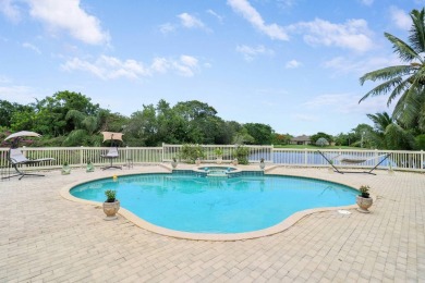 Beautiful lakefront home on 1.25 in the gated community of on Harbour Ridge Yacht and Country Club in Florida - for sale on GolfHomes.com, golf home, golf lot