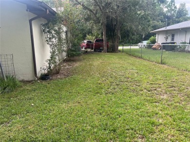 Come a see this great 3/2 Pool Home in the very desirable Citrus on Citrus Springs Country Club in Florida - for sale on GolfHomes.com, golf home, golf lot