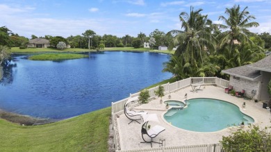 Beautiful lakefront home on 1.25 in the gated community of on Harbour Ridge Yacht and Country Club in Florida - for sale on GolfHomes.com, golf home, golf lot