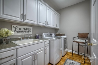 This beautifully updated home is perfectly designed for modern on Catawba Springs Golf Course At Lake Hickory  in North Carolina - for sale on GolfHomes.com, golf home, golf lot