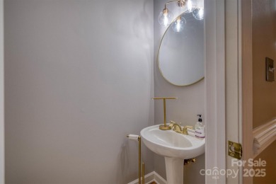 This beautifully updated home is perfectly designed for modern on Catawba Springs Golf Course At Lake Hickory  in North Carolina - for sale on GolfHomes.com, golf home, golf lot