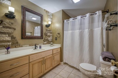 This beautifully updated home is perfectly designed for modern on Catawba Springs Golf Course At Lake Hickory  in North Carolina - for sale on GolfHomes.com, golf home, golf lot