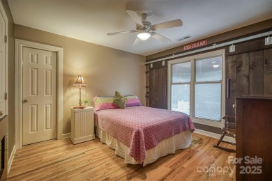 This beautifully updated home is perfectly designed for modern on Catawba Springs Golf Course At Lake Hickory  in North Carolina - for sale on GolfHomes.com, golf home, golf lot