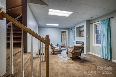 This beautifully updated home is perfectly designed for modern on Catawba Springs Golf Course At Lake Hickory  in North Carolina - for sale on GolfHomes.com, golf home, golf lot