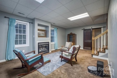 This beautifully updated home is perfectly designed for modern on Catawba Springs Golf Course At Lake Hickory  in North Carolina - for sale on GolfHomes.com, golf home, golf lot
