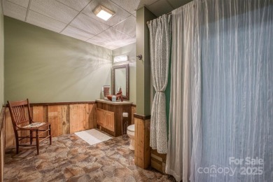 This beautifully updated home is perfectly designed for modern on Catawba Springs Golf Course At Lake Hickory  in North Carolina - for sale on GolfHomes.com, golf home, golf lot