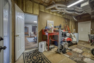 This beautifully updated home is perfectly designed for modern on Catawba Springs Golf Course At Lake Hickory  in North Carolina - for sale on GolfHomes.com, golf home, golf lot