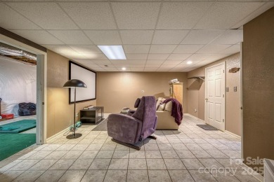 This beautifully updated home is perfectly designed for modern on Catawba Springs Golf Course At Lake Hickory  in North Carolina - for sale on GolfHomes.com, golf home, golf lot
