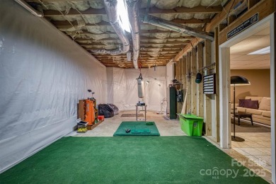 This beautifully updated home is perfectly designed for modern on Catawba Springs Golf Course At Lake Hickory  in North Carolina - for sale on GolfHomes.com, golf home, golf lot