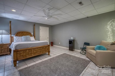 This beautifully updated home is perfectly designed for modern on Catawba Springs Golf Course At Lake Hickory  in North Carolina - for sale on GolfHomes.com, golf home, golf lot