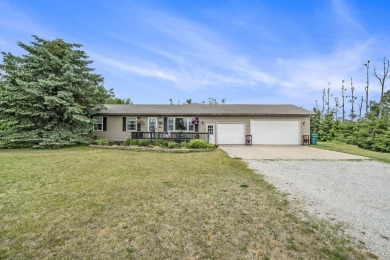 Well-maintained 4 bedroom, 2 bath home offering a spacious and on The Loon Golf Resort in Michigan - for sale on GolfHomes.com, golf home, golf lot