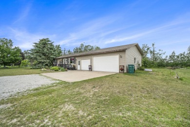 Well-maintained 4 bedroom, 2 bath home offering a spacious and on The Loon Golf Resort in Michigan - for sale on GolfHomes.com, golf home, golf lot