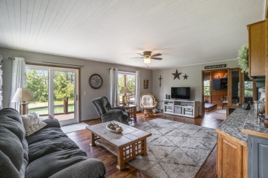Well-maintained 4 bedroom, 2 bath home offering a spacious and on The Loon Golf Resort in Michigan - for sale on GolfHomes.com, golf home, golf lot