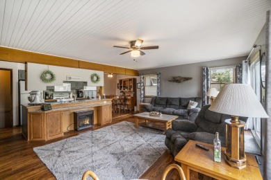 Well-maintained 4 bedroom, 2 bath home offering a spacious and on The Loon Golf Resort in Michigan - for sale on GolfHomes.com, golf home, golf lot