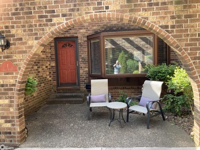 Nestled in a quiet, wooded neighborhood between Sunnyside Park & on Burlington Golf Club in Iowa - for sale on GolfHomes.com, golf home, golf lot