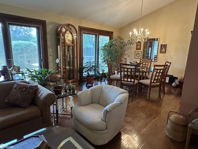 Nestled in a quiet, wooded neighborhood between Sunnyside Park & on Burlington Golf Club in Iowa - for sale on GolfHomes.com, golf home, golf lot