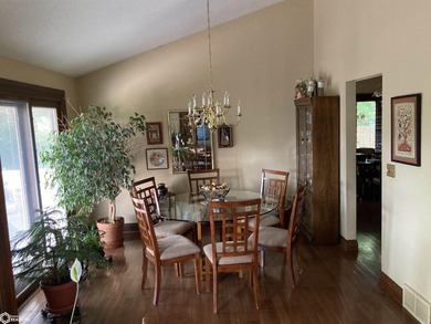 Nestled in a quiet, wooded neighborhood between Sunnyside Park & on Burlington Golf Club in Iowa - for sale on GolfHomes.com, golf home, golf lot