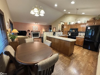 Nestled in a quiet, wooded neighborhood between Sunnyside Park & on Burlington Golf Club in Iowa - for sale on GolfHomes.com, golf home, golf lot