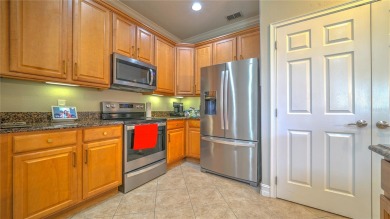 Welcome to this beautifully maintained 2-story townhome located on Eagle Creek Golf Club in Florida - for sale on GolfHomes.com, golf home, golf lot