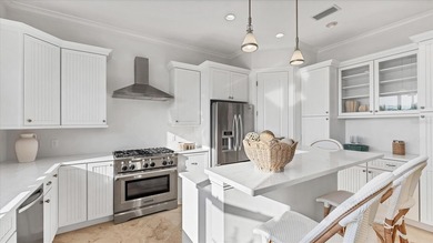 Elevated waterfront living in Key Royale -- built for confidence on Key Royale Club in Florida - for sale on GolfHomes.com, golf home, golf lot