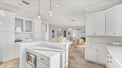 Elevated waterfront living in Key Royale -- built for confidence on Key Royale Club in Florida - for sale on GolfHomes.com, golf home, golf lot