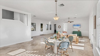 Elevated waterfront living in Key Royale -- built for confidence on Key Royale Club in Florida - for sale on GolfHomes.com, golf home, golf lot