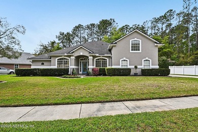 Beautifully maintained 4 bedroom, 4 bath home with a spacious on Golf Club At Fleming Island in Florida - for sale on GolfHomes.com, golf home, golf lot