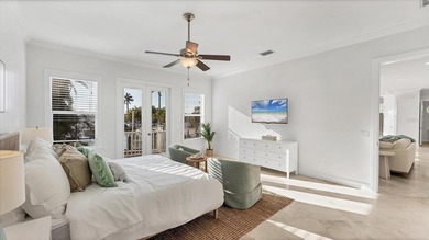 Elevated waterfront living in Key Royale -- built for confidence on Key Royale Club in Florida - for sale on GolfHomes.com, golf home, golf lot