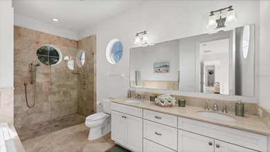 Elevated waterfront living in Key Royale -- built for confidence on Key Royale Club in Florida - for sale on GolfHomes.com, golf home, golf lot