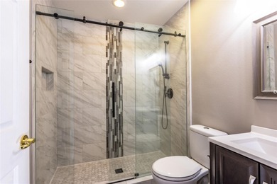 Under contract-accepting backup offers. This Beautiful on The Grand Club Cypress Course in Florida - for sale on GolfHomes.com, golf home, golf lot