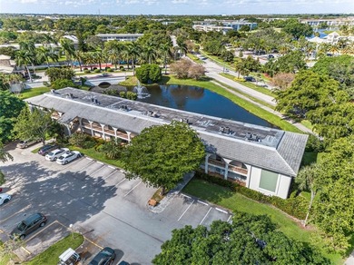 GREAT VALUE!!! ONE OF THE LOWEST PRICED PER SQ/FT!!! PRICED TO on Wynmoor Golf Course in Florida - for sale on GolfHomes.com, golf home, golf lot