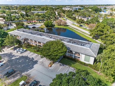 GREAT VALUE!!! LOWEST PRICED IN WYNMOOR, NO UPCOMING ASSESMENT! on Wynmoor Golf Course in Florida - for sale on GolfHomes.com, golf home, golf lot