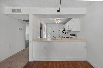 GREAT VALUE!!! ONE OF THE LOWEST PRICED PER SQ/FT!!! PRICED TO on Wynmoor Golf Course in Florida - for sale on GolfHomes.com, golf home, golf lot