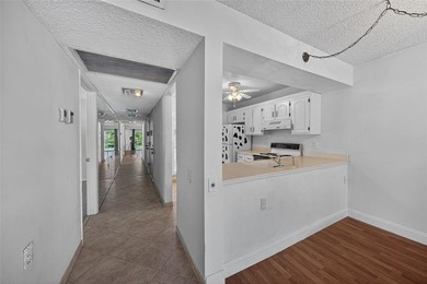 GREAT VALUE!!! ONE OF THE LOWEST PRICED PER SQ/FT!!! PRICED TO on Wynmoor Golf Course in Florida - for sale on GolfHomes.com, golf home, golf lot