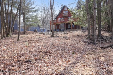 Nestled in the heart of a highly desirable four-season community on The Hideout Golf in Pennsylvania - for sale on GolfHomes.com, golf home, golf lot