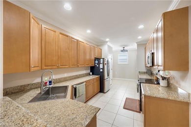 Immaculate 3-bedroom, 2-bath condo with a garage located in on Gateway Golf and Country Club in Florida - for sale on GolfHomes.com, golf home, golf lot