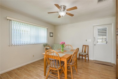 Located in the heart of Palm Harbor, 102 Stanford Drive is on Highland Lakes Executive Golf Course in Florida - for sale on GolfHomes.com, golf home, golf lot