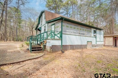 Charming cottage in the gated community of Tall Tree on on Cypress Creek Country Club in Texas - for sale on GolfHomes.com, golf home, golf lot